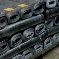 Hand stitched, orange leather long wallet.